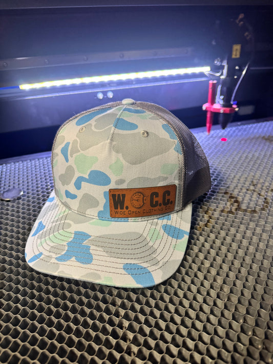 WOCC logo on saltwater camo SnapBack